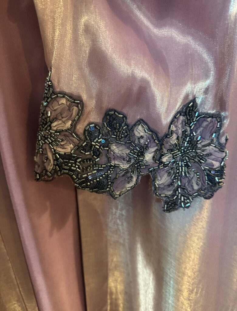 Intricate golden embroidery on royal purple premium fabric - Noor e Muslimah Islamabad.